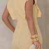 MACACÃO DUBAI PANTALONA DETALHES MARTINGALE - AMARELO