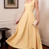 VESTIDO KÁTIA LONGUETE COM ALÇA E LAÇOS - AMARELO