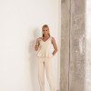 CONJUNTO MÔNICA BLUSA E CALÇA MONTARIA - AREIA